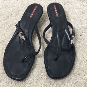 Authentic Prada black sandals with a little heel.